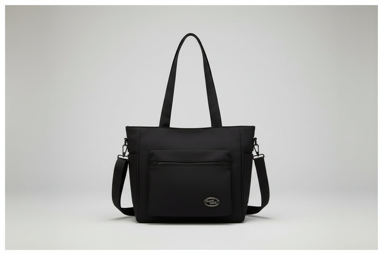 Black bag on a denim jacket with a white background