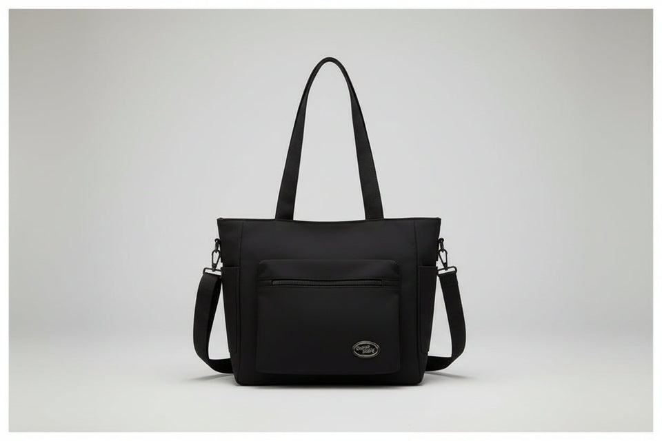 Black bag on a denim jacket with a white background