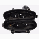 Black backpack with compartments labeled on a white background
