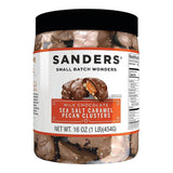 Jar of Sanders Milk Chocolate Sea Salt Caramel Pecan Clusters on a white background