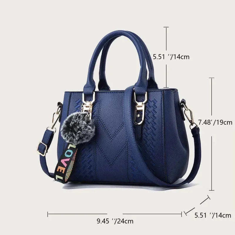 Blue handbag with measurements on a light gray background