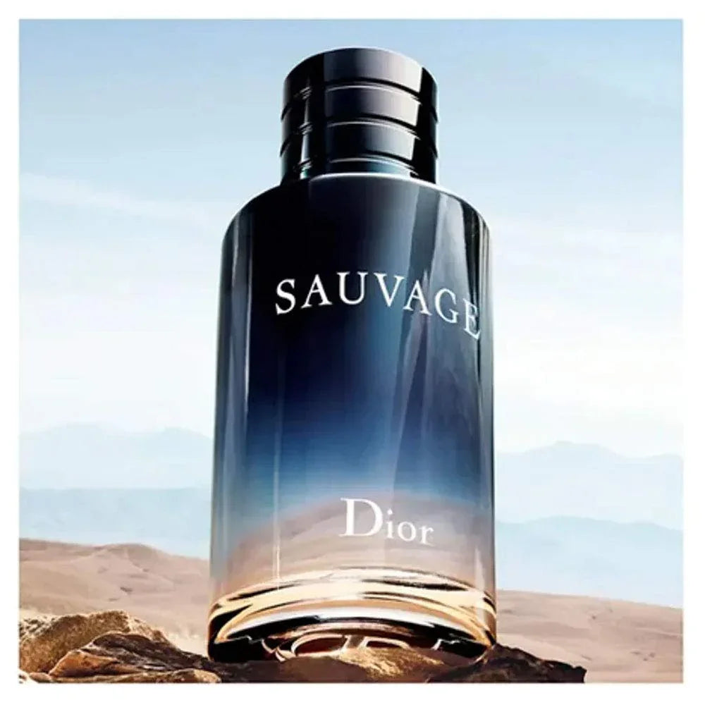 Dior Sauvage perfume bottle with desert landscape in the background