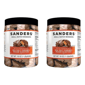 Two jars of Sanders Milk Chocolate Sea Salt Caramel Pecan Clusters on a white background
