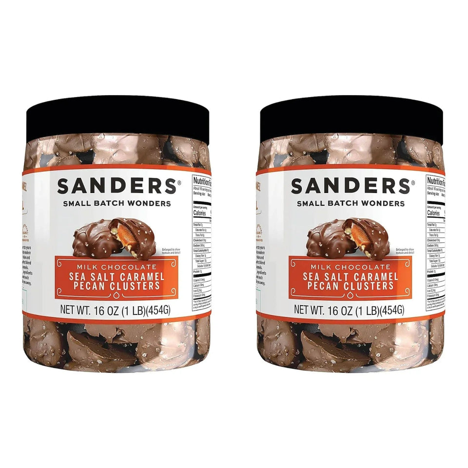 Two jars of Sanders Milk Chocolate Sea Salt Caramel Pecan Clusters on a white background