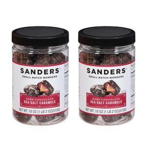 Two jars of Sanders Dark Chocolate Sea Salt Caramels on a white background